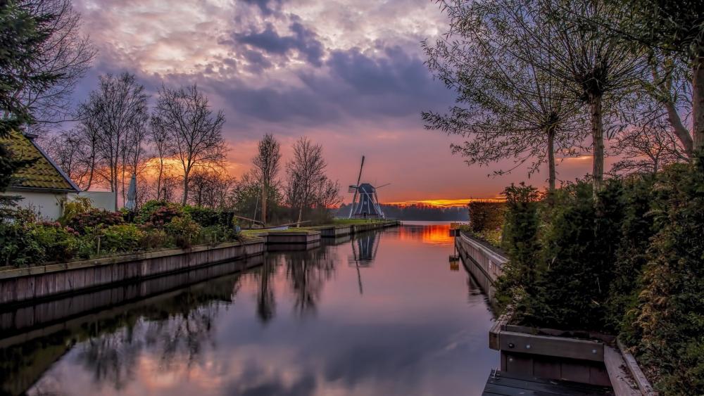 Windmill Serenity at Dusk on Paterswoldsemeer in Haren Netherlands wallpaper