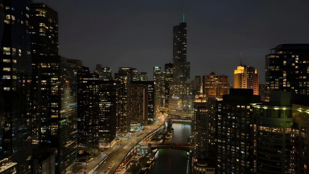 Willis Tower Watching Over Chicago River Nights wallpaper