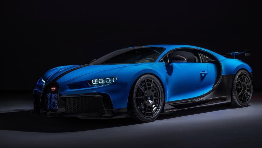 Blue Bugatti Chiron Supercar Under Studio Lights wallpaper