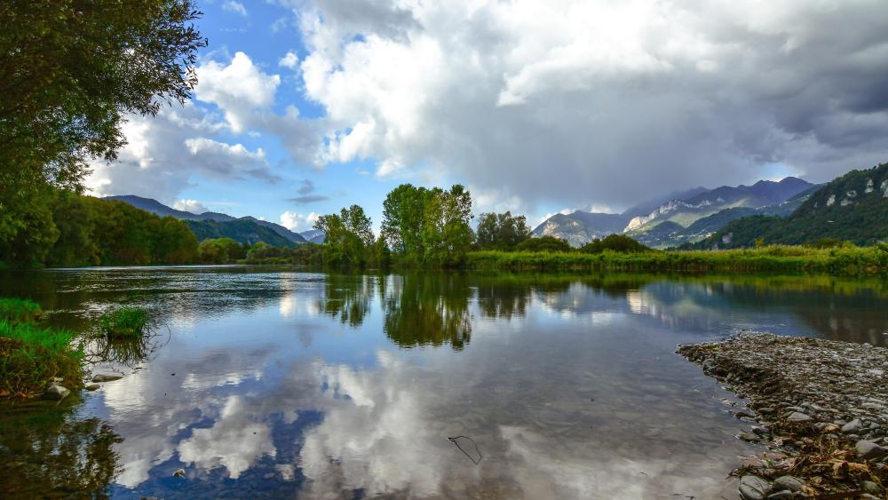Serene Reflections on the Sangone River in Northern Italy wallpaper