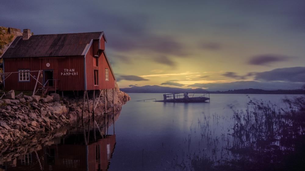 Twilight Serenity Over a Lofoten Cottage by the Still Fjord wallpaper