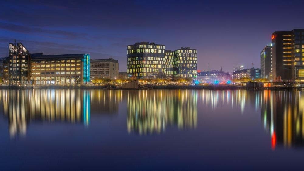 Copenhagen Harbor Lights Mirrored on Calm Night Waters in 5K wallpaper