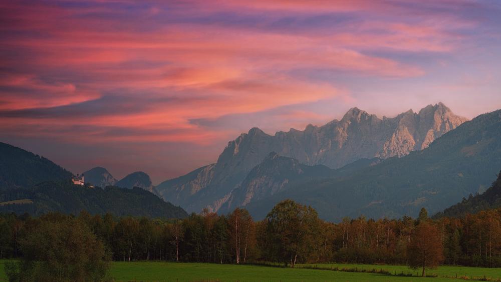 Sunset Glow Over Alpine Valley Peaks in Crisp 5K Detail wallpaper