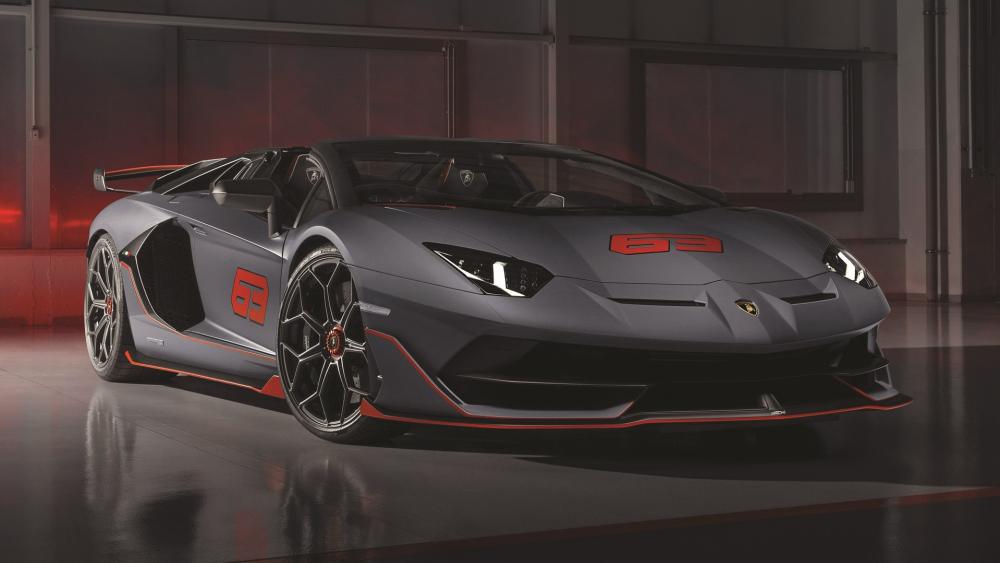 Matte Grey Lamborghini Aventador SVJ with Red Accents in Studio Light wallpaper
