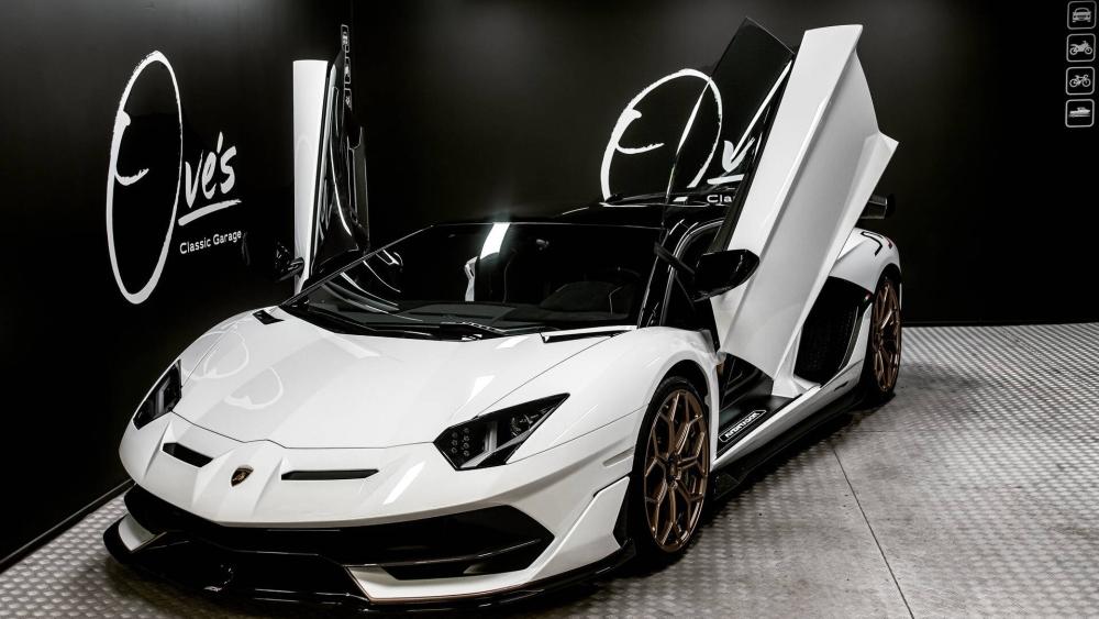 Monochrome White Lamborghini Aventador SVJ with Scissor Doors on Display wallpaper