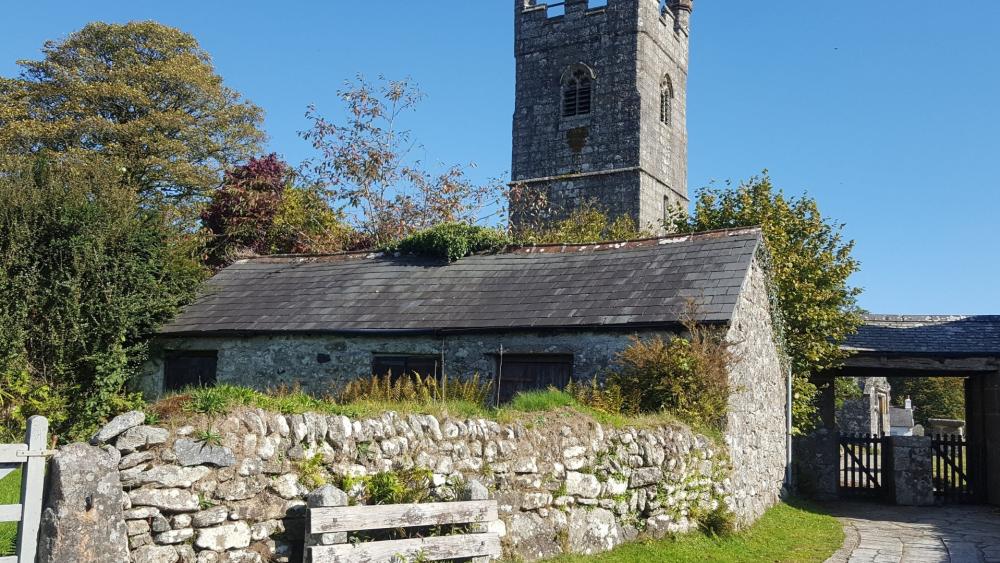 Medieval Stone Walls and Church Tower in Rural Penmaen Wales wallpaper