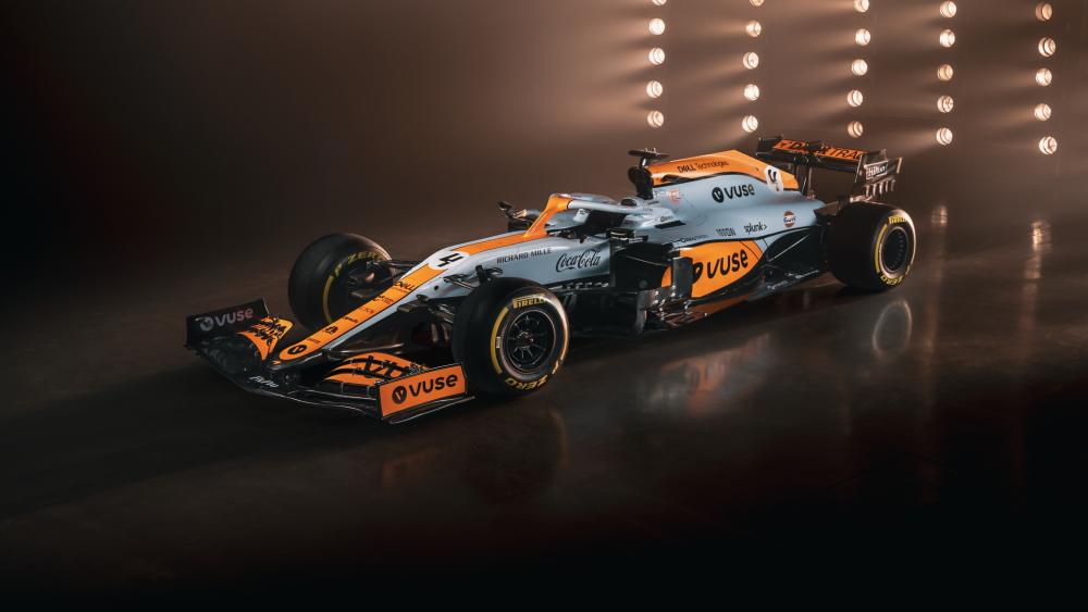 McLaren Formula 1 Car in Dramatic Studio Lighting 4K Wallpaper wallpaper