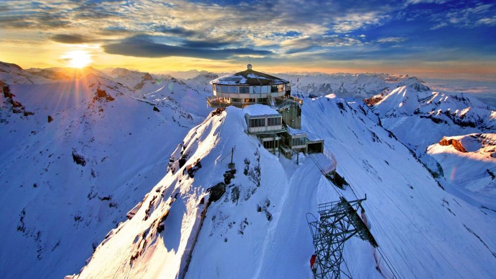 Sunrise over Schilthorn in the Alps wallpaper