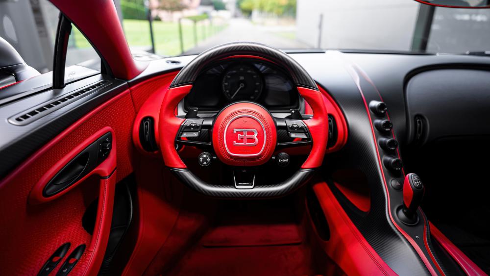 Bugatti Chiron Interior in Red Leather and Carbon Fiber 4K Wallpaper wallpaper