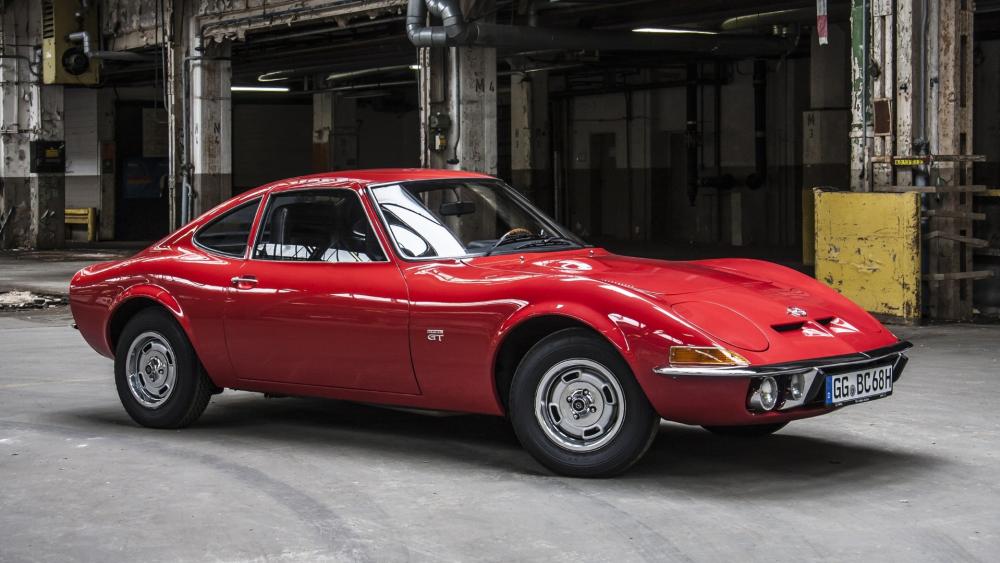 Red Opel GT Classic Sports Car in Industrial Warehouse wallpaper
