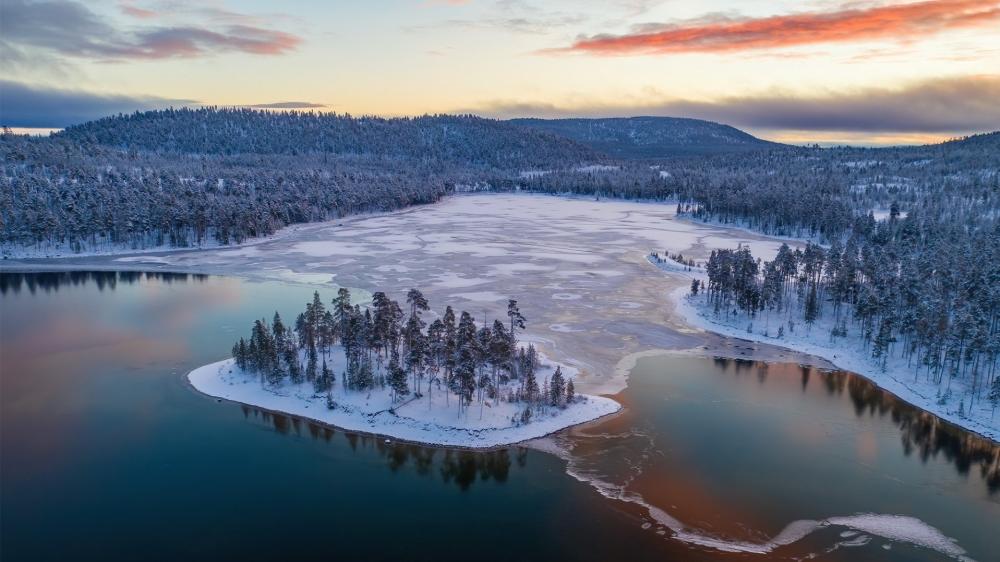 Frozen Islands at Dawn in Finnish Lakeland Taipalsaari wallpaper