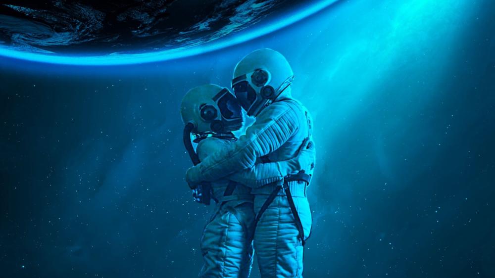 Blue Orbit Embrace Astronaut Lovers Drifting in Starlit Serenity wallpaper