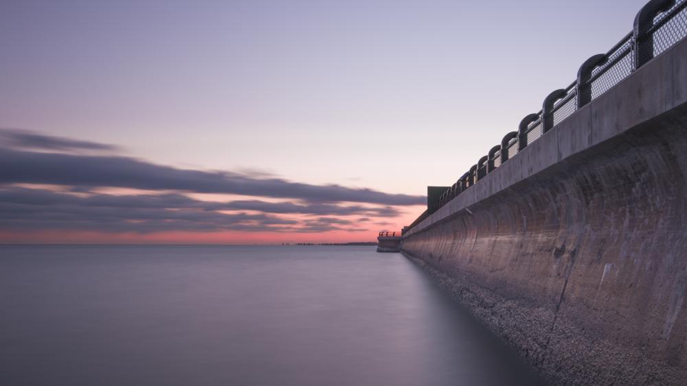 Twilight Sea Horizon Beside a Silent Seawall in Crisp 4K wallpaper