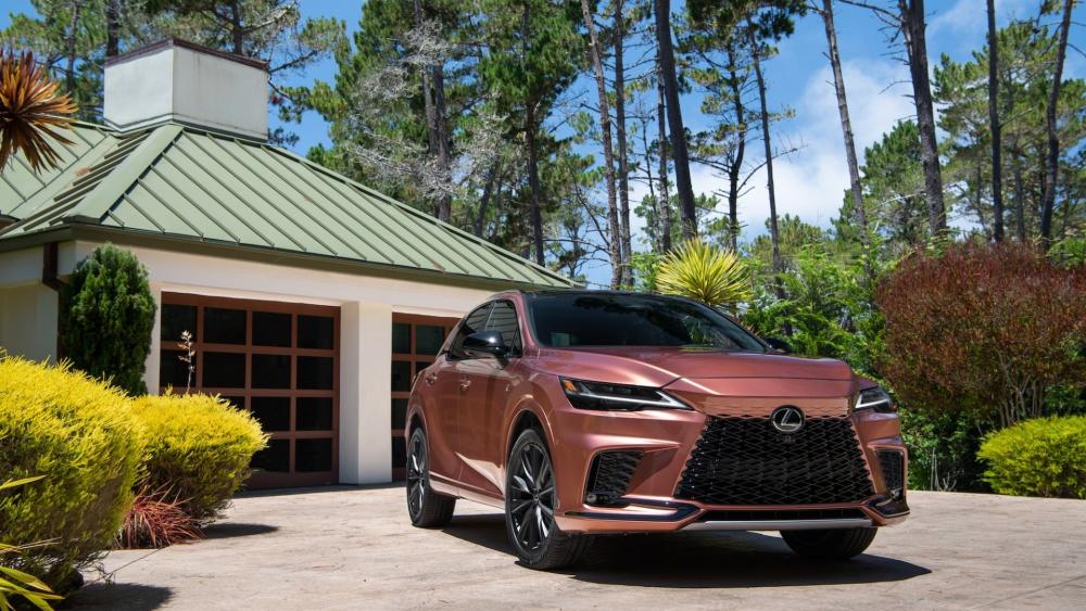 Copper Lexus RX Hybrid SUV in Modern Driveway Serenity wallpaper