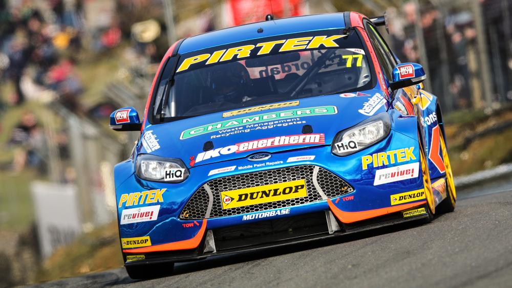 Ford Focus ST BTCC Charge in Vivid 4K Motorsport Action wallpaper