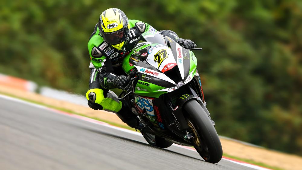 Kawasaki Superbike Rider Leaning Hard Through a High Speed Corner wallpaper