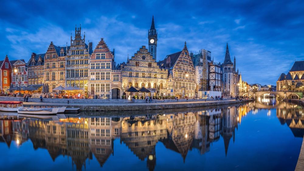 Evening Reflections Along Graslei Canal in Ghent Belgium wallpaper