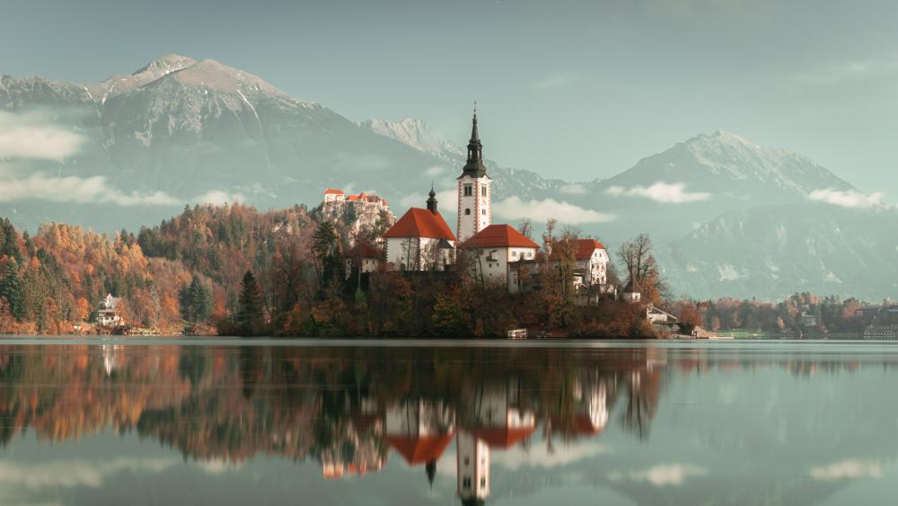 Autumn Serenity at Lake Bled Island and Castle Reflection wallpaper