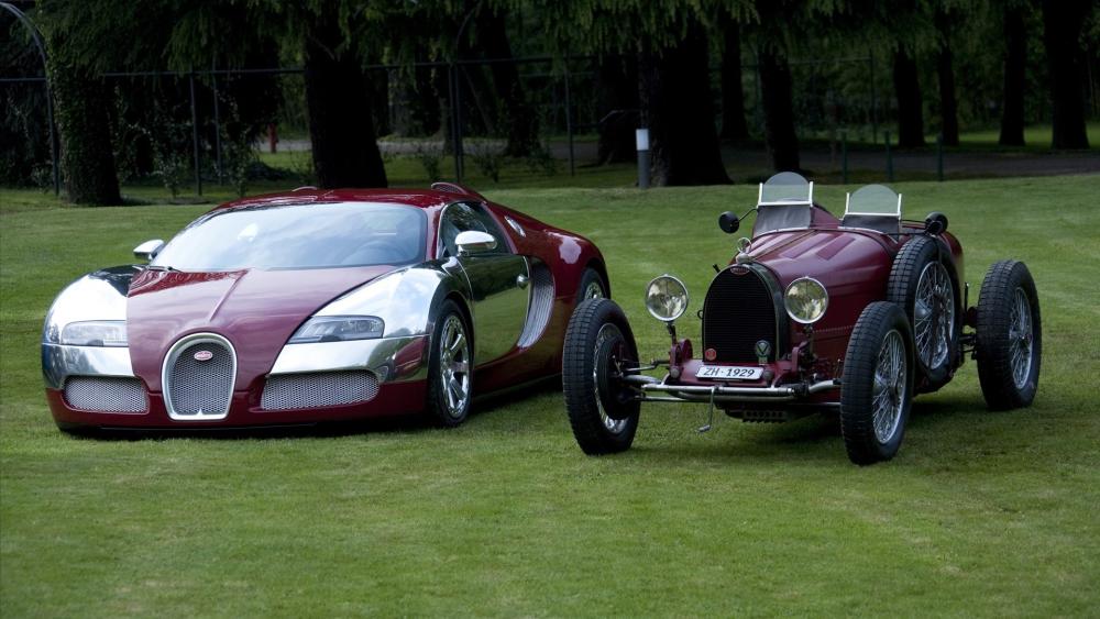 Bugatti Veyron Meets Classic Bugatti Heritage On Lush Green Lawn wallpaper