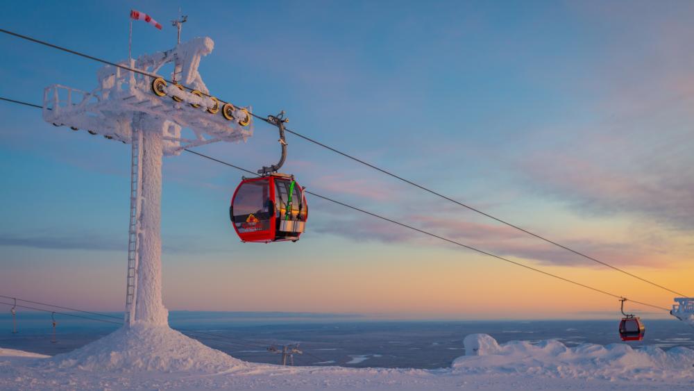 Frosted Cable Car Gliding Over Ylläs Lapland Winter Sunset wallpaper