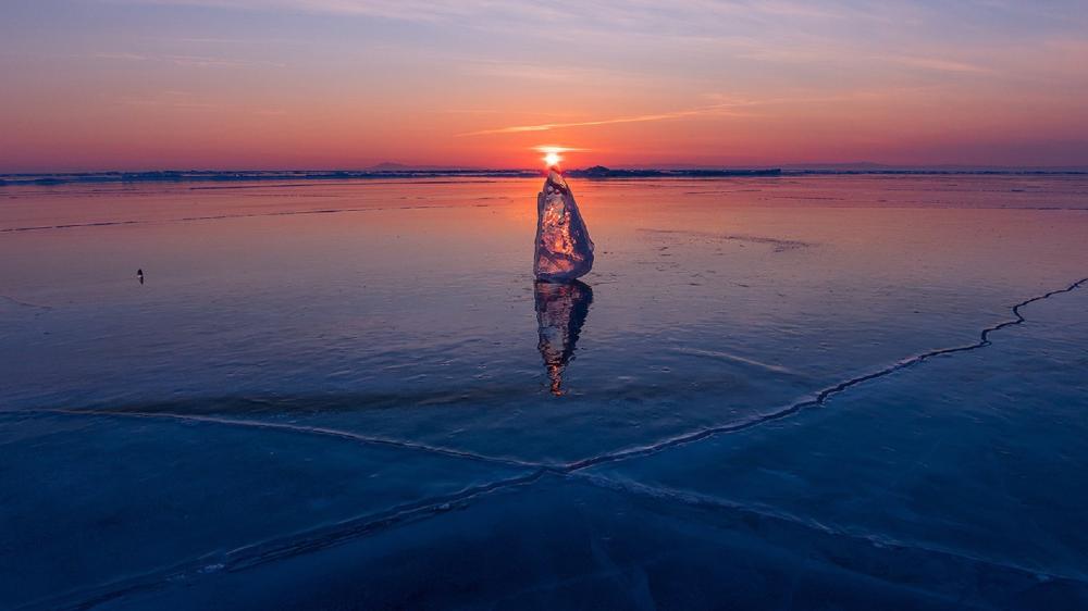 Sunset Crystal on Frozen Lake Baikal Mirror wallpaper