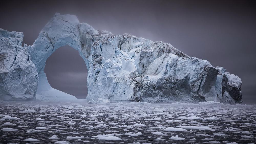 Cathedral Ice Arch Over the Southern Ocean Sea Ice in 4K wallpaper