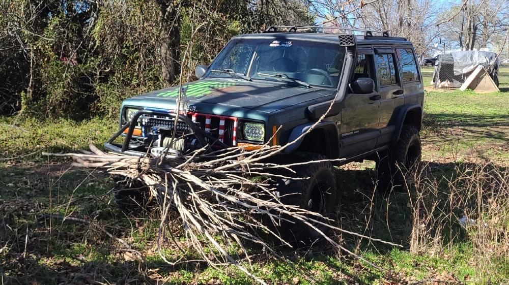 2000 Jeep Cherokee with sticks wallpaper