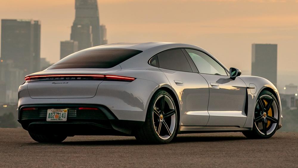 Porsche Taycan Skyline Sunset Rear View Performance Wallpaper wallpaper