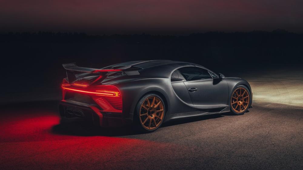 Bugatti Chiron Night Stance with Glowing Taillights and Bronze Wheels wallpaper