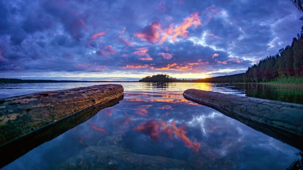 Blue Hour Serenity Over a Mirror Calm Lake wallpaper