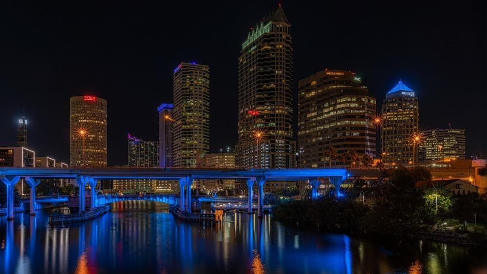 Tampa Night Skyline Reflections Over the Riverwalk Bridge wallpaper