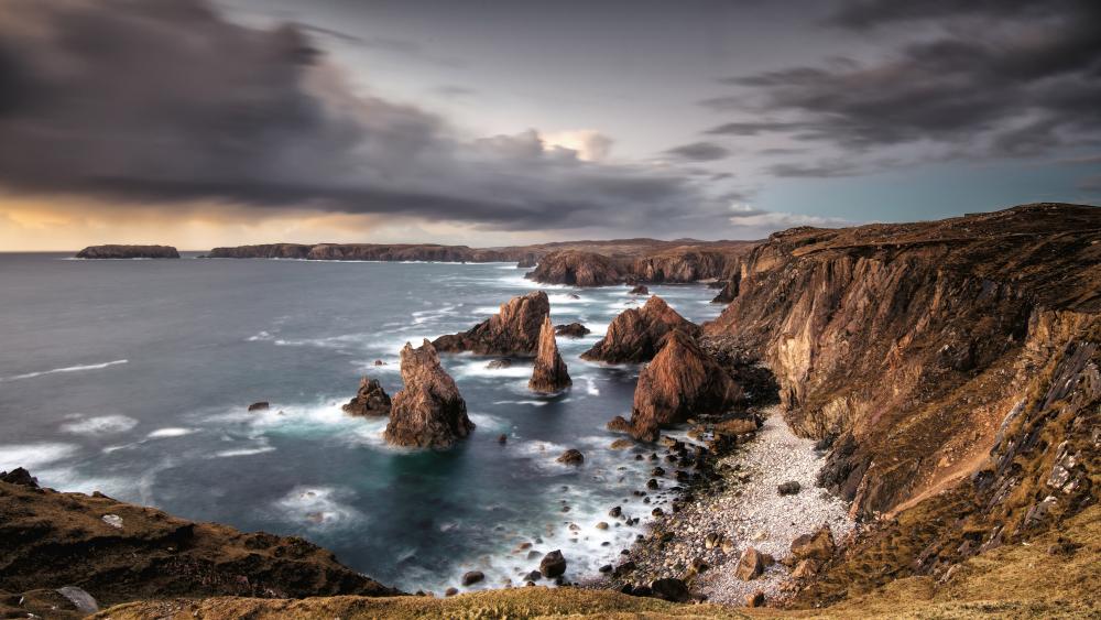 Stormlit Sea Stacks of Mangersta on the Isle of Lewis Coast wallpaper
