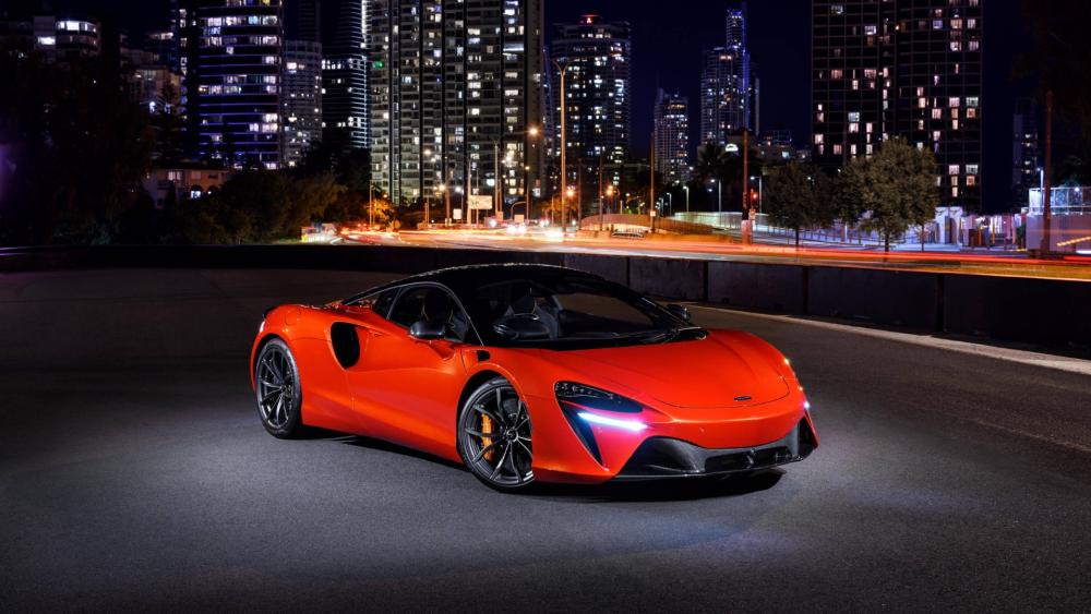 McLaren Artura Glow on Midnight City Streets wallpaper