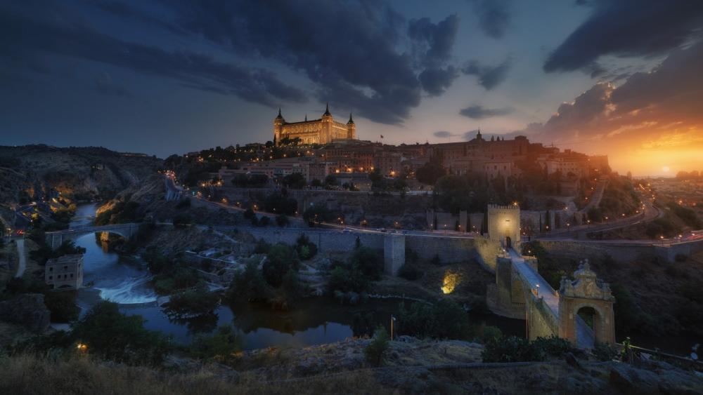 Twilight Over Toledo Castle and Tagus River in Castilla la Mancha Spain wallpaper