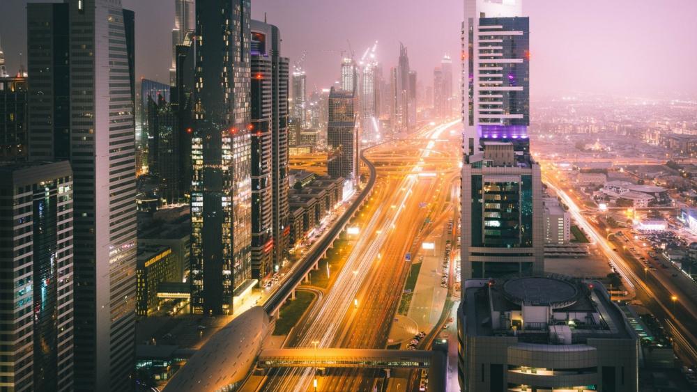 Dubai Skyline Light Trails on Sheikh Zayed Road at Dusk wallpaper