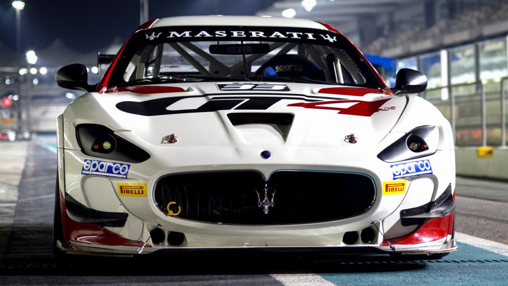 Maserati World Rally Car Head On Under Night Track Lights wallpaper