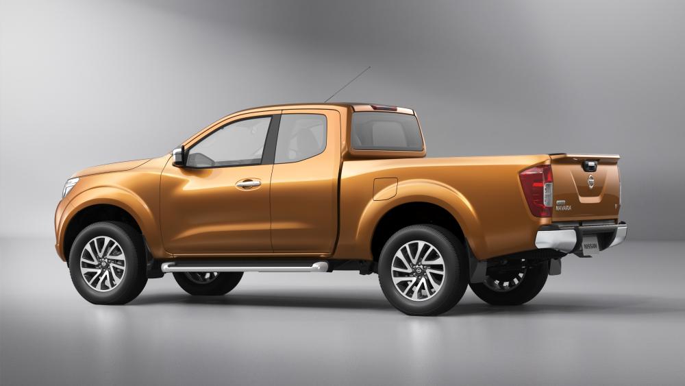 Bronze Nissan Navara Pickup in Sleek Studio Side Profile 4K wallpaper