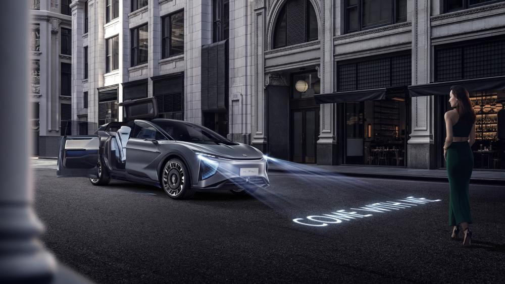 HiPhi Luxury Electric SUV Arrives in the City Night Glow wallpaper