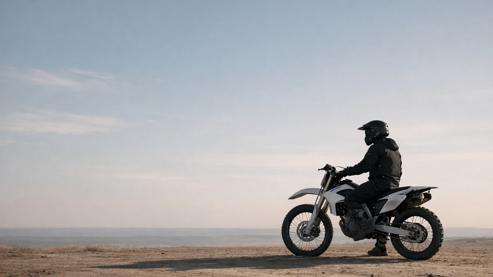 Lone Desert Rider on Adventure Motorcycle at Dawn wallpaper