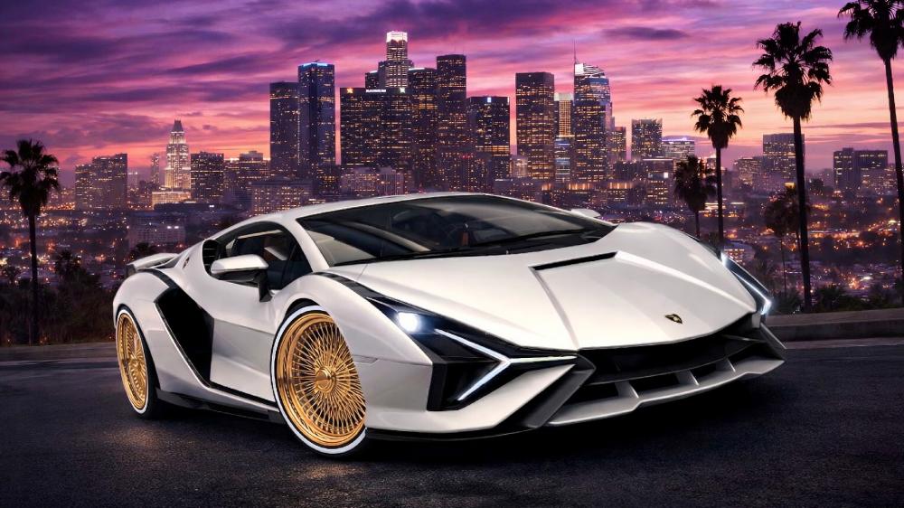 White Lamborghini Sian with Gold Rims Over Los Angeles Skyline wallpaper
