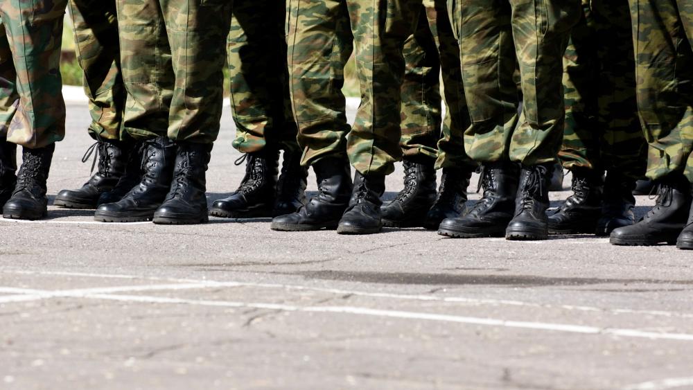 Boots on Parade Military Formation in Camouflage Uniforms 4K wallpaper