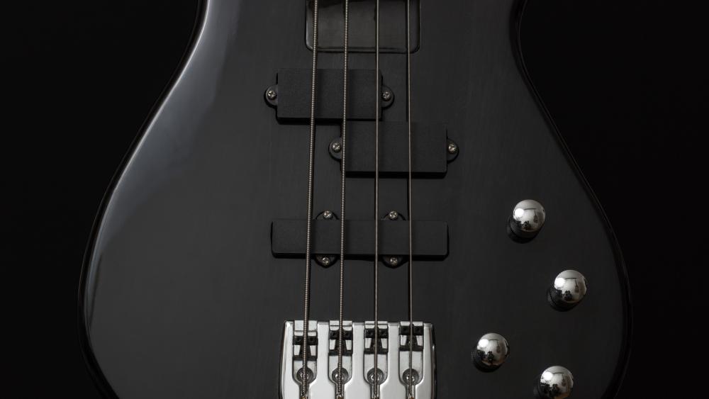 Midnight Black Bass Guitar Close Up in Crisp 5K Detail wallpaper