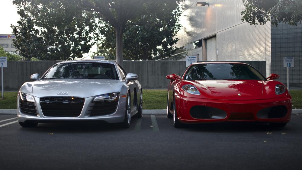 Audi R8 and Red Ferrari Supercars Parked in Urban Shadowed Light wallpaper