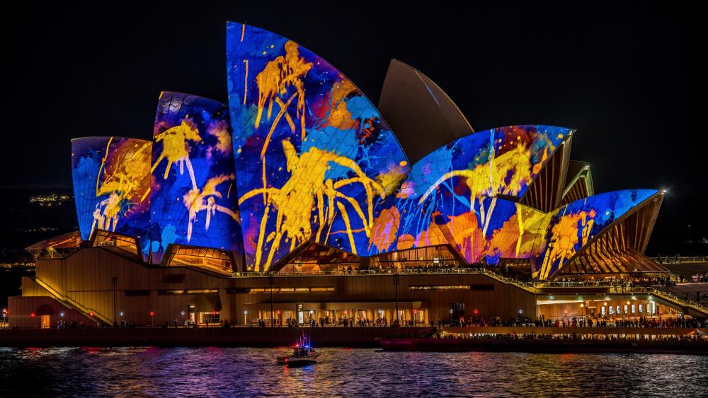 Sydney Opera House Night Lightshow in Vivid Colors wallpaper