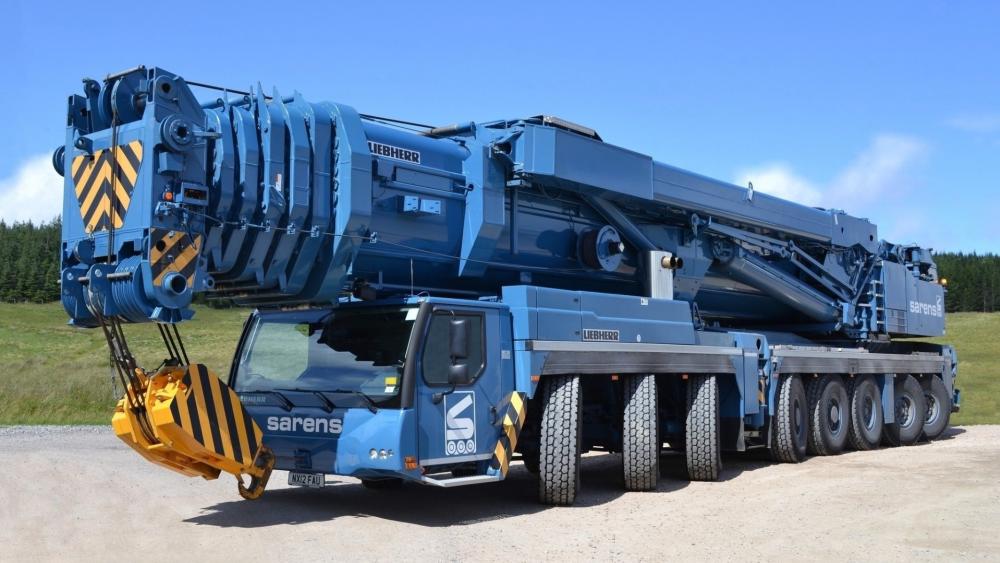 Heavy Duty Crane Truck on Rural Road wallpaper