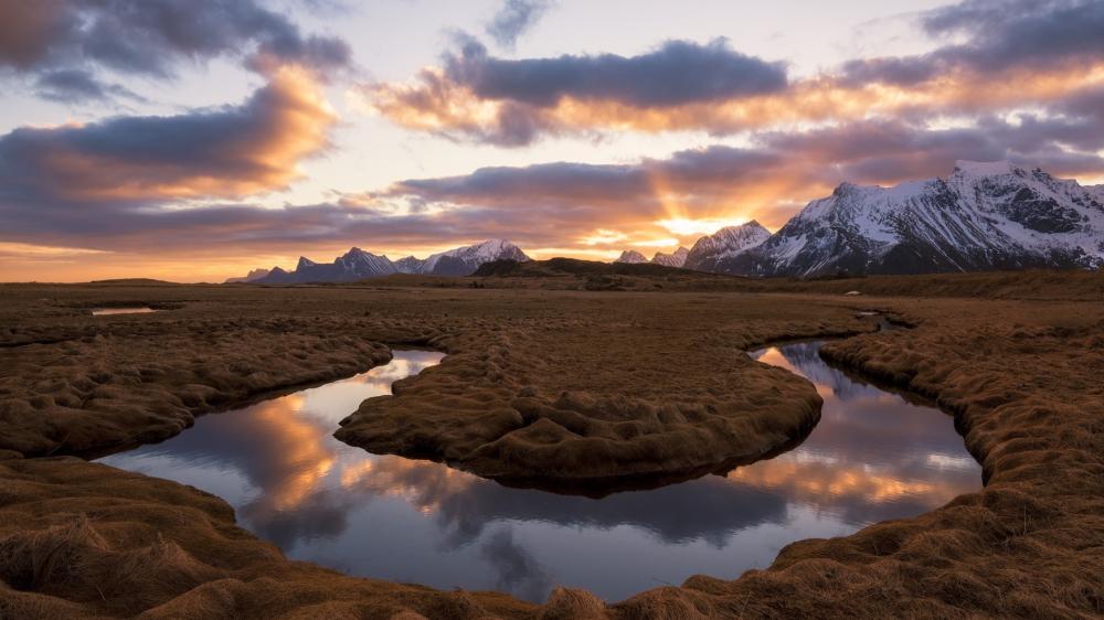 Lofoten Sunset Over River and Snowy Peaks wallpaper
