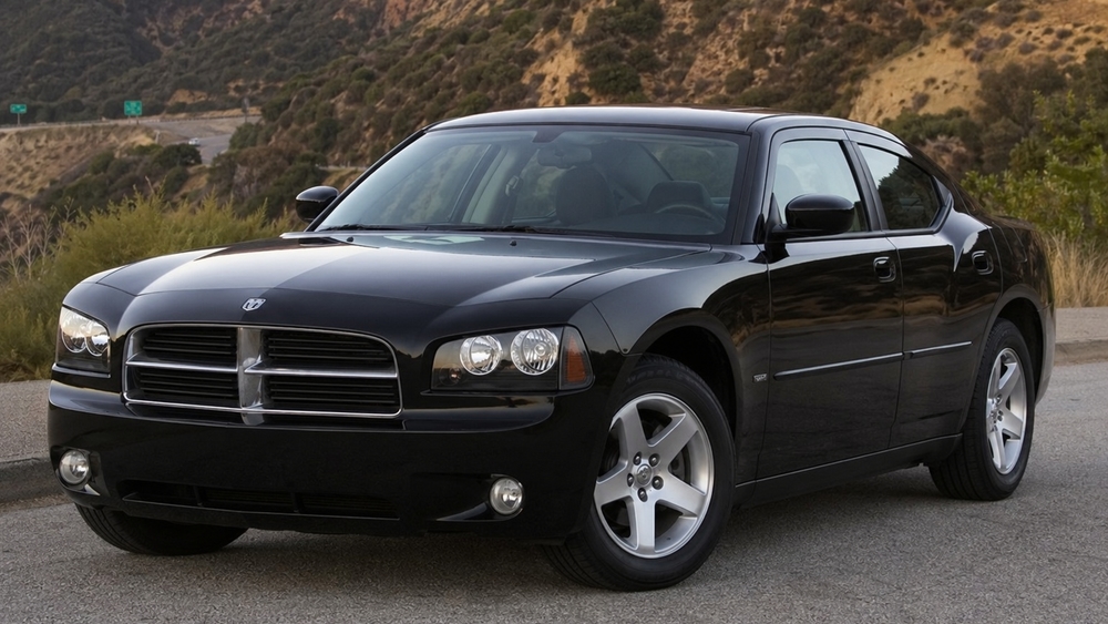 Black Dodge Charger on Scenic Road wallpaper