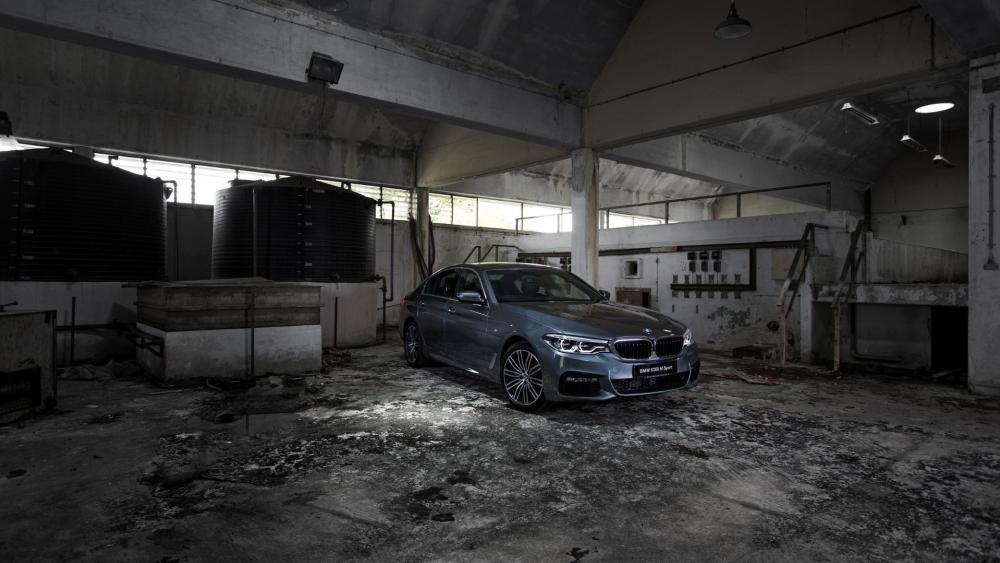Urban BMW Sedan in Industrial Warehouse wallpaper