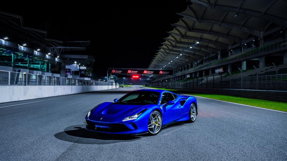 Blue Ferrari F8 Tributo Under Night Lights wallpaper