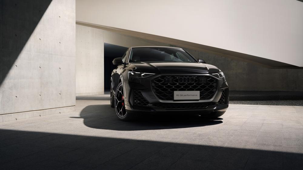 Audi RS Q8 Performance in Shadowed Modern Architecture wallpaper